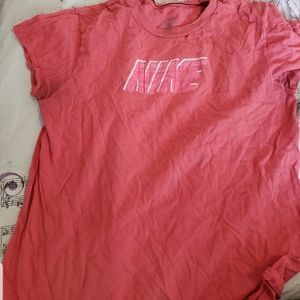 A pink Nike shirt